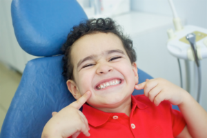 a child visiting their pediatric dentist